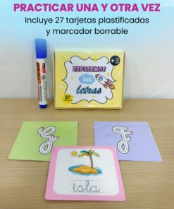 Caja del kit de 27 tarjetas plastificadas para repasar letra cursiva acompañada de tarjetas con la palabra isla e ilustraciones infantiles sobre una mesa.