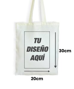 Vista frontal de una bolsa totebag crema con un recuadro de líneas punteadas que indica el área de impresión máxima para sublimación. Las flechas señalan las medidas del diseño con un ancho de veinte centímetros y un alto de treinta centímetros, con el texto Tu diseño aquí.