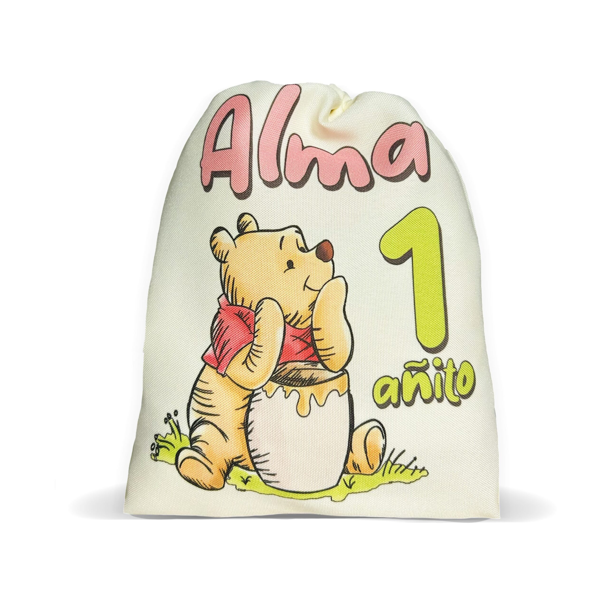 Bolsita de tela personalizada tono crema con ilustración de Winnie Pooh, el nombre Alma y el número 1 añito para souvenir.